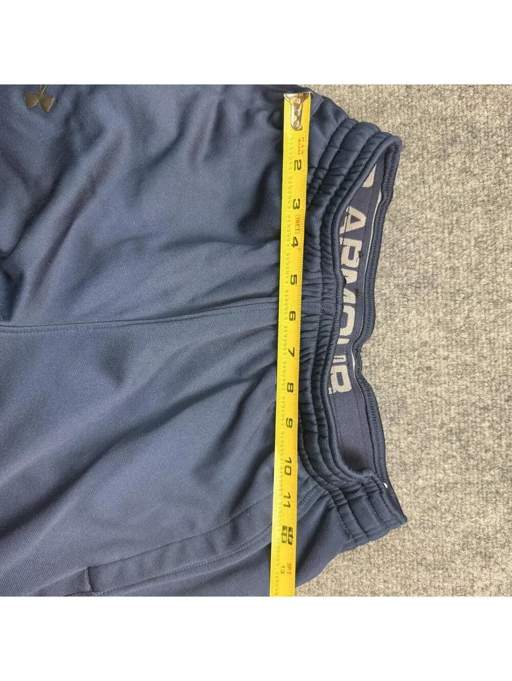 Under Armour Navy Blue Sweatpants Size: Small slight knee wearing
